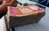 نگاه دینار عراقی به دلار آمریکایی